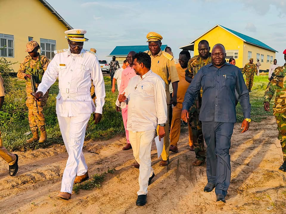 Officials walking at a construction site during the reported Rajaf visit