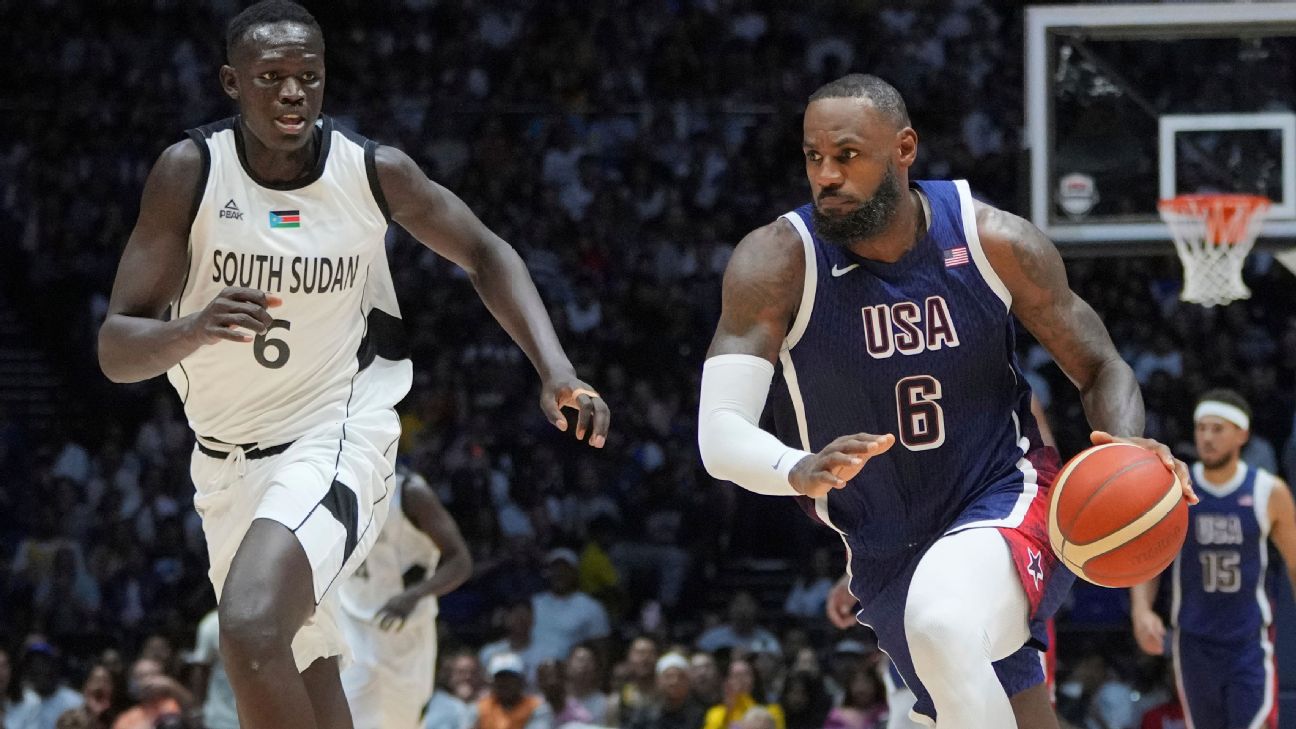 South Sudan player defending during an international basketball game